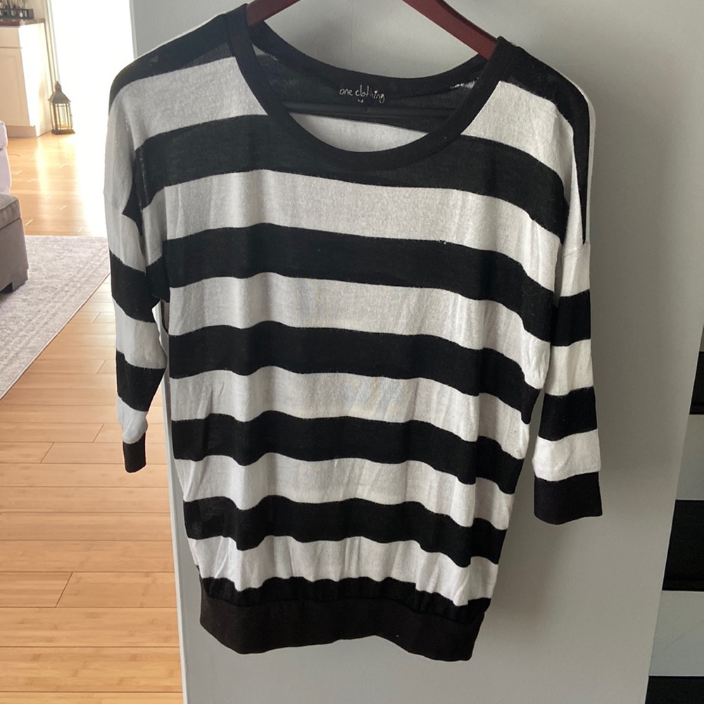 Black and white stripe size medium, no rips holes stains